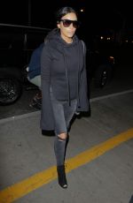 KIM KARDASHIAN Arrives at LAX Airport in Los Angeles 04/20/2015