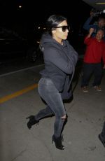 KIM KARDASHIAN Arrives at LAX Airport in Los Angeles 04/20/2015