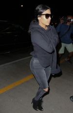 KIM KARDASHIAN Arrives at LAX Airport in Los Angeles 04/20/2015