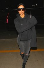 KIM KARDASHIAN Arrives at LAX Airport in Los Angeles 04/20/2015