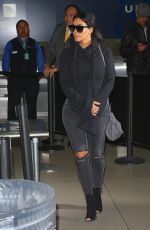 KIM KARDASHIAN Arrives at LAX Airport in Los Angeles 04/20/2015