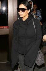 KIM KARDASHIAN Arrives at LAX Airport in Los Angeles 04/20/2015