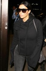 KIM KARDASHIAN Arrives at LAX Airport in Los Angeles 04/20/2015