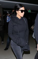 KIM KARDASHIAN Arrives at LAX Airport in Los Angeles 04/20/2015