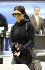 KIM KARDASHIAN Arrives at LAX Airport in Los Angeles 04/20/2015
