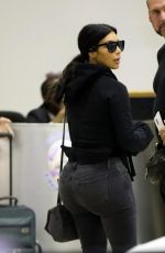 KIM KARDASHIAN Arrives at LAX Airport in Los Angeles 04/20/2015