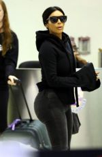 KIM KARDASHIAN Arrives at LAX Airport in Los Angeles 04/20/2015