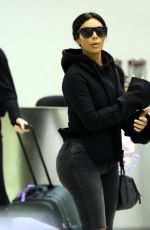 KIM KARDASHIAN Arrives at LAX Airport in Los Angeles 04/20/2015