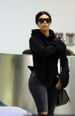 KIM KARDASHIAN Arrives at LAX Airport in Los Angeles 04/20/2015
