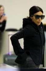 KIM KARDASHIAN Arrives at LAX Airport in Los Angeles 04/20/2015