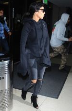 KIM KARDASHIAN Arrives at LAX Airport in Los Angeles 04/20/2015