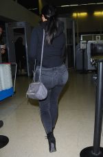KIM KARDASHIAN Arrives at LAX Airport in Los Angeles 04/20/2015
