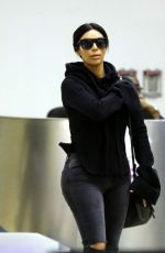 KIM KARDASHIAN Arrives at LAX Airport in Los Angeles 04/20/2015