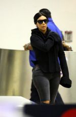 KIM KARDASHIAN Arrives at LAX Airport in Los Angeles 04/20/2015