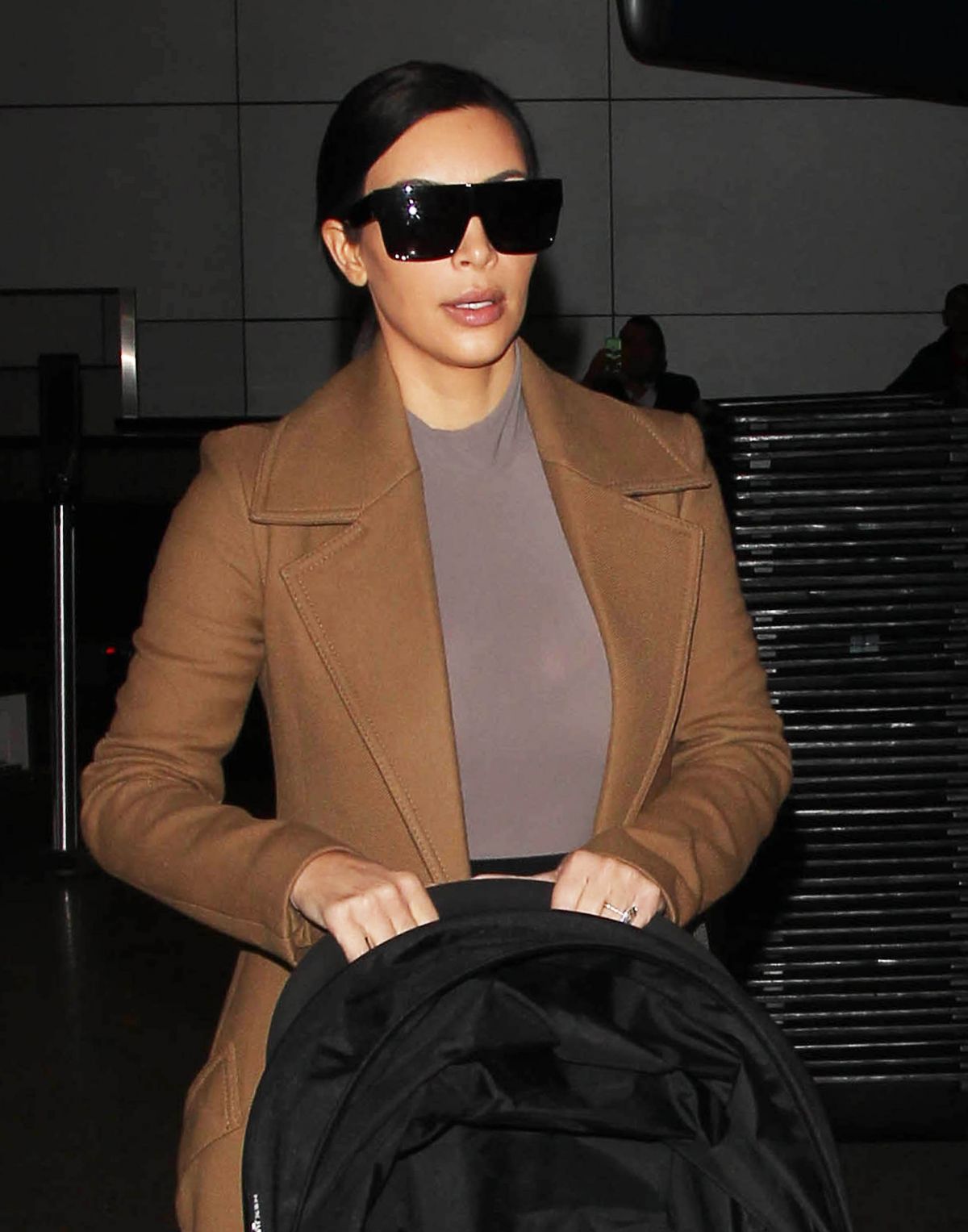 KIM KARDASHIAN at LAX Airport in Los Angeles KIM KARDASHIAN at LAX Airport in Los Angeles