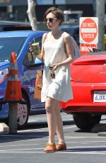 LILY COLLINS Arrives at Juice Bar in West Hollywood 04/18/2015