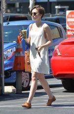 LILY COLLINS Arrives at Juice Bar in West Hollywood 04/18/2015