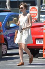 LILY COLLINS Arrives at Juice Bar in West Hollywood 04/18/2015