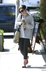 LILY COLLINS at Earth Bar in West Hollywood