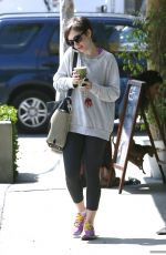 LILY COLLINS at Earth Bar in West Hollywood