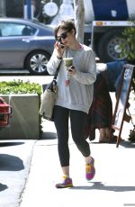 LILY COLLINS at Earth Bar in West Hollywood