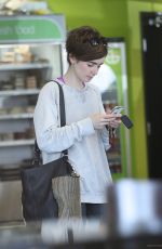 LILY COLLINS at Earth Bar in West Hollywood