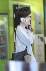 LILY COLLINS at Earth Bar in West Hollywood
