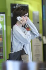 LILY COLLINS at Earth Bar in West Hollywood