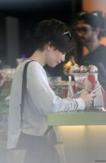LILY COLLINS at Earth Bar in West Hollywood