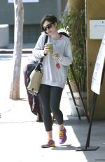 LILY COLLINS at Earth Bar in West Hollywood