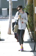 LILY COLLINS at Earth Bar in West Hollywood