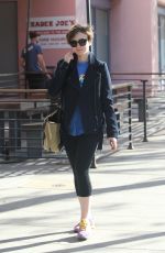 LILY COLLINS Heading to a Gym in West Hollywood 04/18/2015