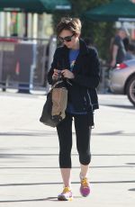 LILY COLLINS Heading to a Gym in West Hollywood 04/18/2015