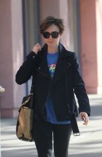 LILY COLLINS Heading to a Gym in West Hollywood 04/18/2015