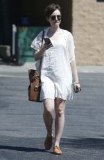 LILY COLLINS Out and About in West Hollywood 04/18/2015