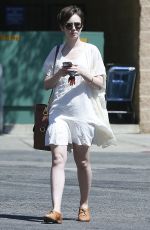 LILY COLLINS Out and About in West Hollywood 04/18/2015