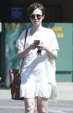LILY COLLINS Out and About in West Hollywood 04/18/2015