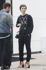LILY COLLINS Out Shopping in Beverly Hills 04/24/2015