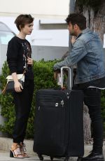 LILY COLLINS Out Shopping in Beverly Hills 04/24/2015