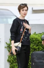 LILY COLLINS Out Shopping in Beverly Hills 04/24/2015