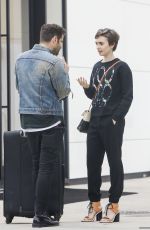 LILY COLLINS Out Shopping in Beverly Hills 04/24/2015