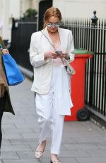 LINDSAY LOHAN Out Shopping at Bond Street in London 04/24/2015