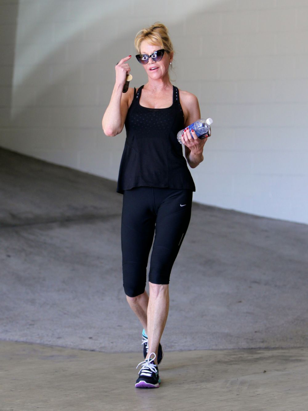 MELANIE GRIFFITH in Tights Leaves a Gym in Los Angeles 04/27/2015.