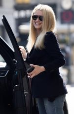 MICHELLE HUNZIKER Arrives at Armani Hotel in Milan