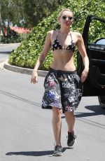 MILEY CYRUS in Bikini Top Out and About in Los Angeles 04/30/2015