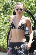 MILEY CYRUS in Bikini Top Out and About in Los Angeles 04/30/2015