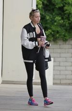 MILEY CYRUS Stopping for a Juice at Robeks in Los Angeles