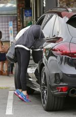 MILEY CYRUS Stopping for a Juice at Robeks in Los Angeles