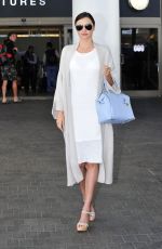 MIRANDA KERR Arrives at Los Angeles International Airport