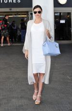 MIRANDA KERR Arrives at Los Angeles International Airport